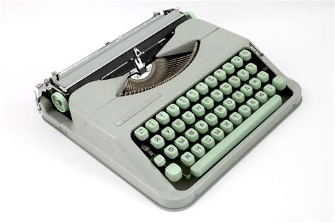 hermes baby hemingway|Hermes typewriter baby.